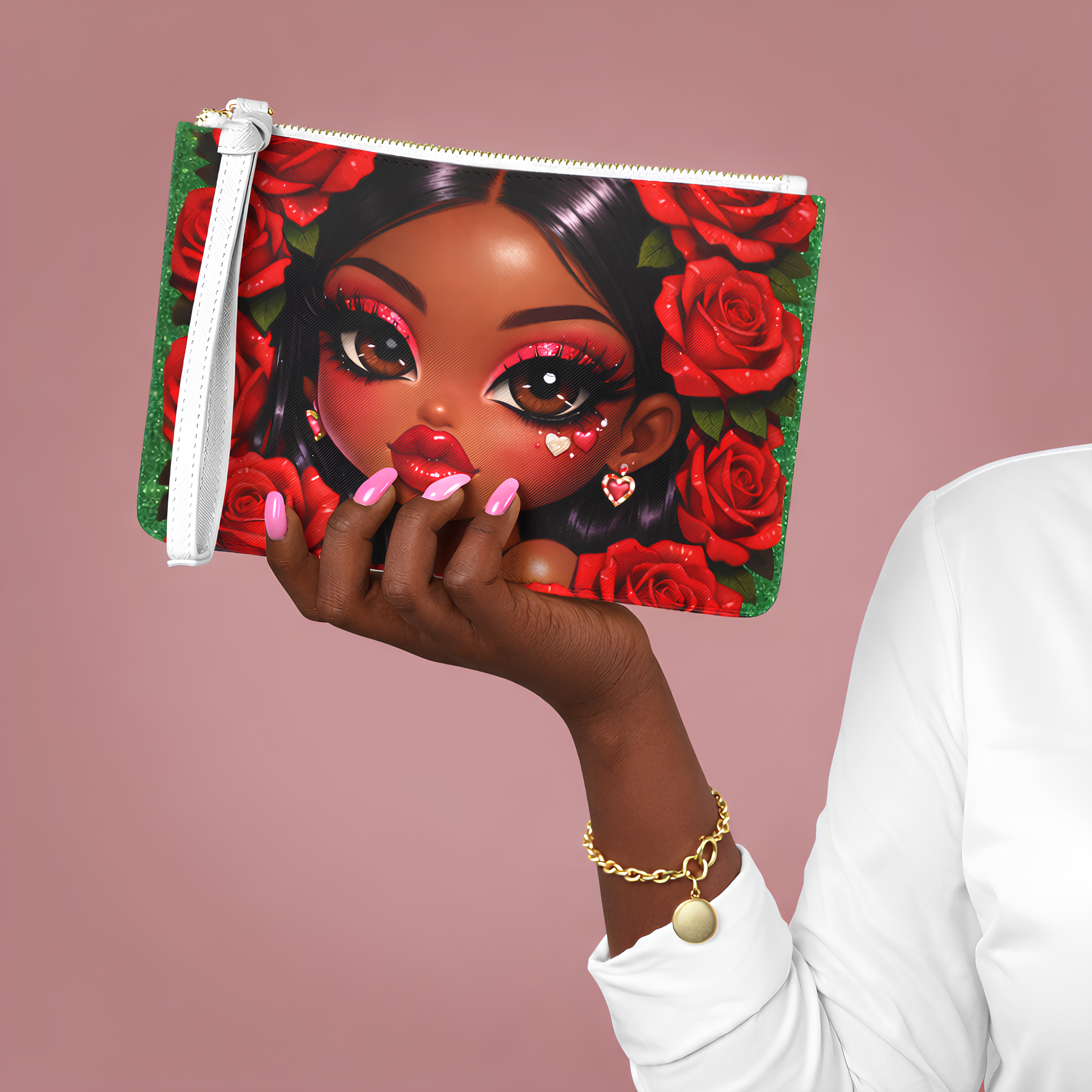 Hand holding a pouch with a colorful design of a face surrounded by roses on a pink background